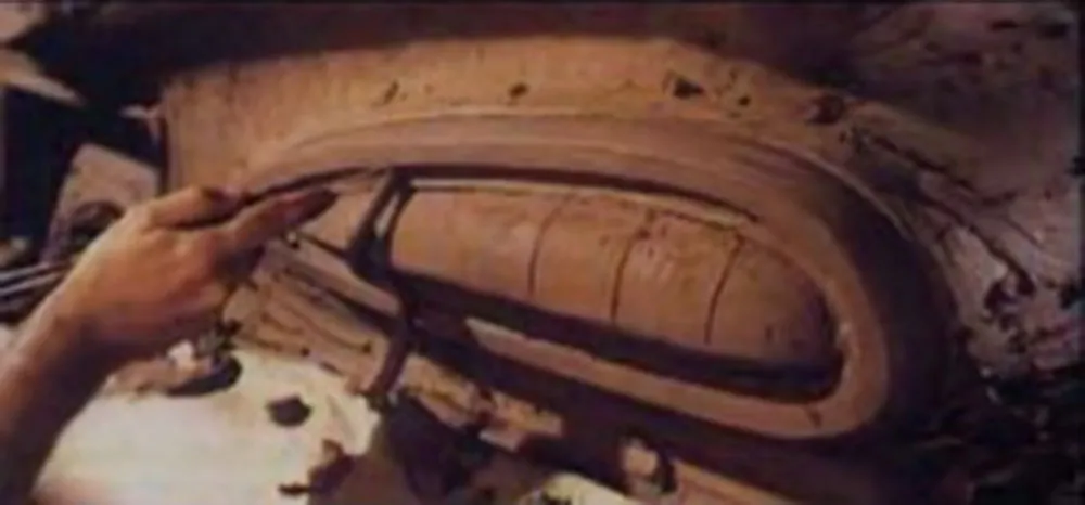 Still from 'American Look' showing a car prototype being sculpted from clay.